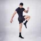 ZYAVE Men's Black Compression T-Shirt - Athletic Action Pose