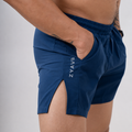Close-up side view of ZYAVE Men's Air Force Running Shorts featuring a deep side pocket, side split hem and lightweight performance fabric.