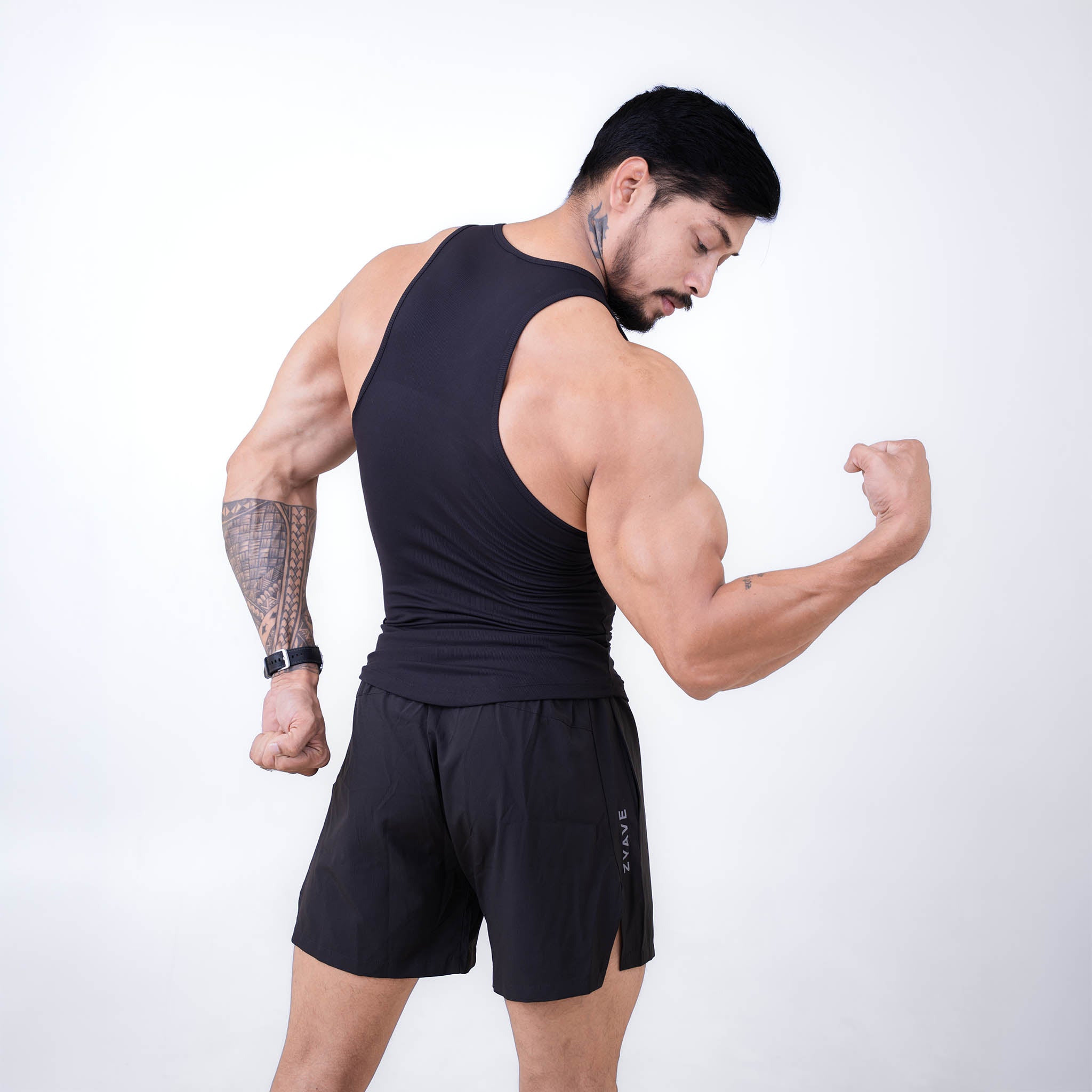ZYAVE Men's Black Ribbed Tank Top - Back Angle Flex Pose